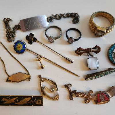 Sale Photo Thumbnail #244: This lot is for items we found in the Bottom of the Jewelry Box.  Several rings, tie clasps, pins and bars. Some interesting pieces that could be used for many purposes.
