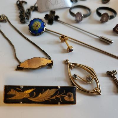 Sale Photo Thumbnail #247: This lot is for items we found in the Bottom of the Jewelry Box.  Several rings, tie clasps, pins and bars. Some interesting pieces that could be used for many purposes.