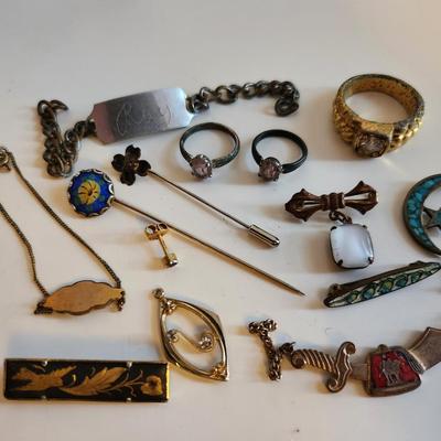 Sale Photo Thumbnail #249: This lot is for items we found in the Bottom of the Jewelry Box.  Several rings, tie clasps, pins and bars. Some interesting pieces that could be used for many purposes.