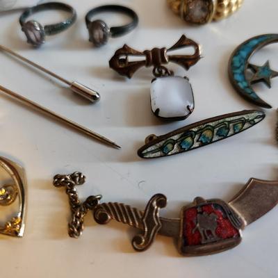 Sale Photo Thumbnail #246: This lot is for items we found in the Bottom of the Jewelry Box.  Several rings, tie clasps, pins and bars. Some interesting pieces that could be used for many purposes.