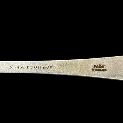 Sale Photo Thumbnail #624: [31.13g] This fork is marked “N. Matson & Co,” which is the retailer, and is believed to be made by Gorham, in the “Nightingale” pattern, circa 1880s. It is characterized by delicate engraving, featuring a bird among floral/vine elements. It is mo