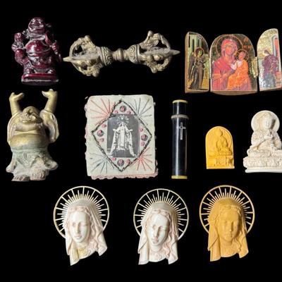 Sale Photo Thumbnail #625: Includes a resin Buddha, a brass Buddha, Virgin Mary icons, a tri-fold Orthodox plaque, and more. Total of ten pieces. Measurement of longest: 3.5”L. [BK]