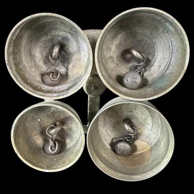 Sale Photo Thumbnail #677: Includes two brass bells, and a Kuan Yin statue. [BK]