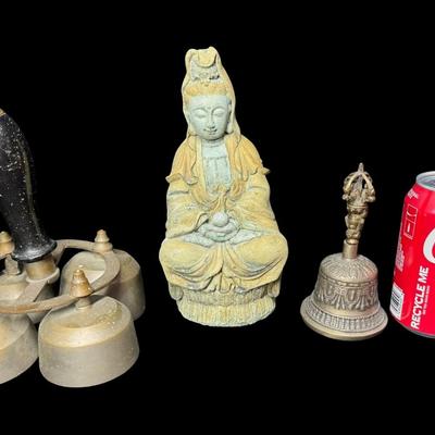 Sale Photo Thumbnail #676: Includes two brass bells, and a Kuan Yin statue. [BK]