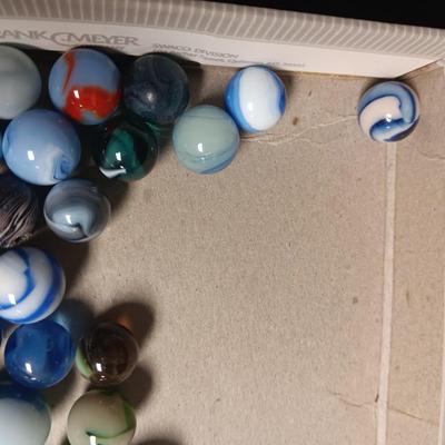 AN ASSORTMENT OF MARBLES