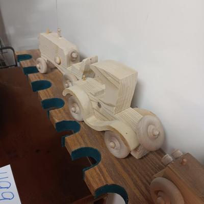 3 HANDCRAFTED WOODEN TOYS AND A CALIFORNIA RAISINS WATCH