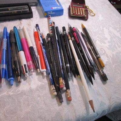 Sale Photo Thumbnail #35: Pencils, pens, tape, post-it notes, new stamp pads, mini calculator, china markers, key chains, note pads. Pens are tested and they work.