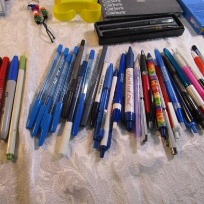 Sale Photo Thumbnail #36: Pencils, pens, tape, post-it notes, new stamp pads, mini calculator, china markers, key chains, note pads. Pens are tested and they work.