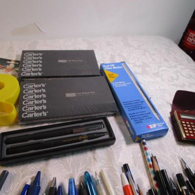 Sale Photo Thumbnail #34: Pencils, pens, tape, post-it notes, new stamp pads, mini calculator, china markers, key chains, note pads. Pens are tested and they work.