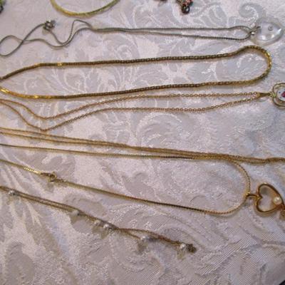 Sale Photo Thumbnail #39: Necklaces, bracelets, charms, keychains, clip earrings. See pictures