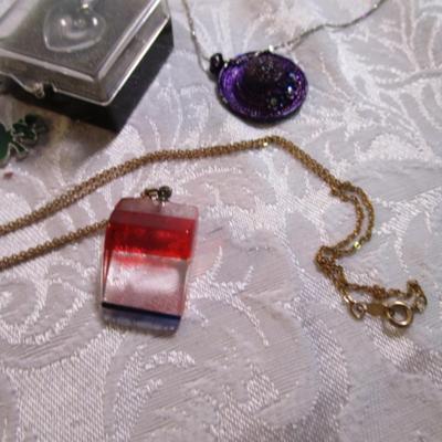 Sale Photo Thumbnail #46: Necklaces, bracelets, charms, keychains, clip earrings. See pictures
