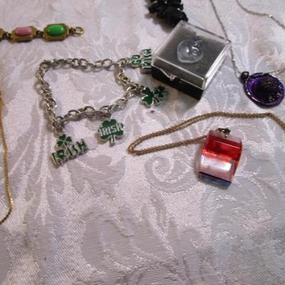 Sale Photo Thumbnail #45: Necklaces, bracelets, charms, keychains, clip earrings. See pictures