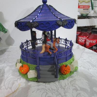 Sale Photo Thumbnail #83: Talking, moving & singing witch takes 3 AA batteries not included; musical, lighted & moving Halloween carousel takes 4 AA batteries not included; metal black cat; Boo-pers makes creepy noise; scarecrow pumpkin