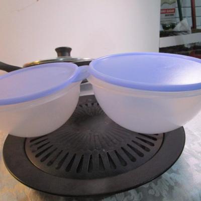 Sale Photo Thumbnail #114: Stove-top grill, 2 frying pans, 3 covered mixing bowls, 9 x 13" cake pan, loaf pan