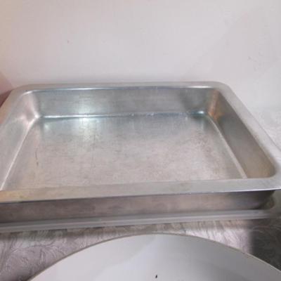 Sale Photo Thumbnail #113: Stove-top grill, 2 frying pans, 3 covered mixing bowls, 9 x 13" cake pan, loaf pan