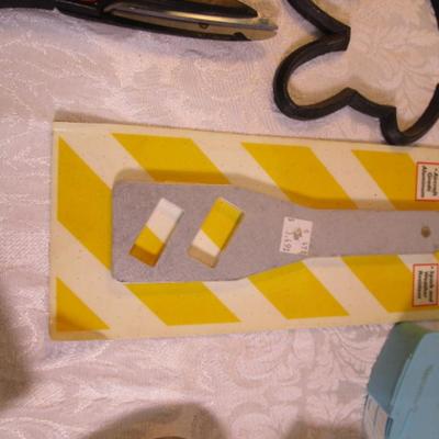 Sale Photo Thumbnail #130: adjustable measuring spoon, spatulasr, measuring spoons, whip, jar openers, pancake forms, can opener, kitchen scissors, peeler, ice cream scoops, ice pick, bottle openers, gas line wrench, tupperware labels, knife, bear trive