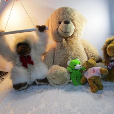 Sale Photo Thumbnail #380: Rory is 9" tall & takes 2 AA batteries not included, biggest bear is 20" tall, breast cancer bear is 6-1/2", the green bear is 5-1/2", Monkey is 11" tall & has a tag  See pictures