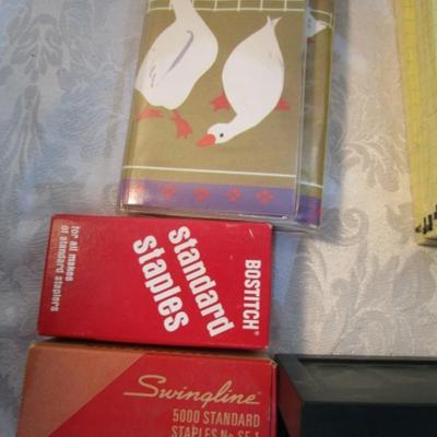 Sale Photo Thumbnail #543: 12 white 5" x 7" legal pads, 4 Post-it 4" x 6" lined pads, 4 AA batteries good to 2034, 2 AAA batteries good to 2030, index cards 4 x 6, 1 post-it 3" x 5" pad, 1 Post-it 2" x 3" pads, Cross pen in case, 2 boxes of staples, 1 roll shipping tape, 1 letter o