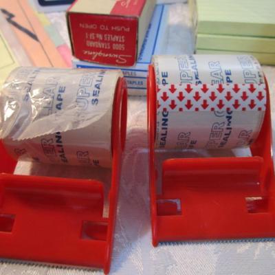 Sale Photo Thumbnail #552: 7 yellow 5" x 7" legal pads 3 Post-it 4" x 6" lined pads, 2 boxes of staples, 1 box 3.62" x 6.5" security envelopes, 2 pkg (100 ea) plus 66 loose 4" x 6"  index  cards, 2 rolls shipping tape, 3 pkg index dividers, ruler, clipboard, wirebound notebook