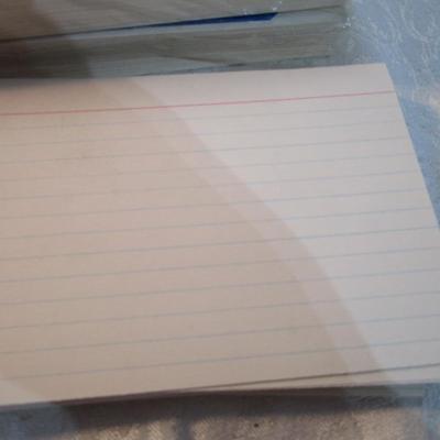 Sale Photo Thumbnail #546: 7 yellow 5" x 7" legal pads 3 Post-it 4" x 6" lined pads, 2 boxes of staples, 1 box 3.62" x 6.5" security envelopes, 2 pkg (100 ea) plus 66 loose 4" x 6"  index  cards, 2 rolls shipping tape, 3 pkg index dividers, ruler, clipboard, wirebound notebook