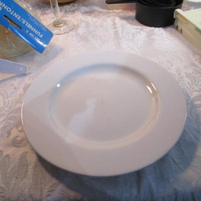 Sale Photo Thumbnail #588: 24 silicone cupcake bakers, box of 100 paper cupcake liners, 9 green and 7 red sundae dishes, multi-function grater, sink strainer, 25 plastic ice cubes inn a plastic lid with lid, 1 8" white plate, 1 new set of 3 funnels, 1 Tupperware funnel, 1 big funne