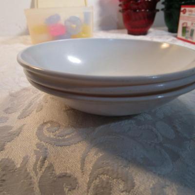 Sale Photo Thumbnail #597: 24 silicone cupcake bakers, box of 100 paper cupcake liners, 9 green and 7 red sundae dishes, multi-function grater, sink strainer, 25 plastic ice cubes inn a plastic lid with lid, 1 8" white plate, 1 new set of 3 funnels, 1 Tupperware funnel, 1 big funne