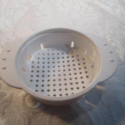 Sale Photo Thumbnail #596: 24 silicone cupcake bakers, box of 100 paper cupcake liners, 9 green and 7 red sundae dishes, multi-function grater, sink strainer, 25 plastic ice cubes inn a plastic lid with lid, 1 8" white plate, 1 new set of 3 funnels, 1 Tupperware funnel, 1 big funne