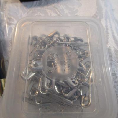 Sale Photo Thumbnail #607: 1 hinge-lid plastic container, stationery kit, greeting cards & Christmas cards, 2 new pkg Acrylic gems (blue & red), teal glass gems, 6' measuring tape, compass, 20 fine markers, 2 pens, container of safety pins