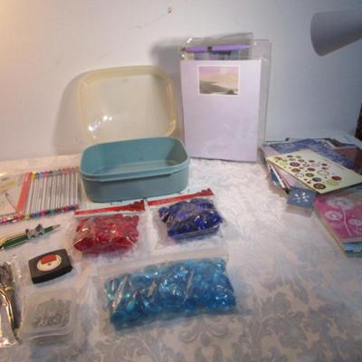 Sale Photo Thumbnail #602: 1 hinge-lid plastic container, stationery kit, greeting cards & Christmas cards, 2 new pkg Acrylic gems (blue & red), teal glass gems, 6' measuring tape, compass, 20 fine markers, 2 pens, container of safety pins