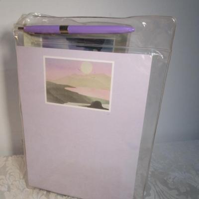 Sale Photo Thumbnail #615: 1 hinge-lid plastic container, stationery kit, greeting cards & Christmas cards, 2 new pkg Acrylic gems (blue & red), teal glass gems, 6' measuring tape, compass, 20 fine markers, 2 pens, container of safety pins