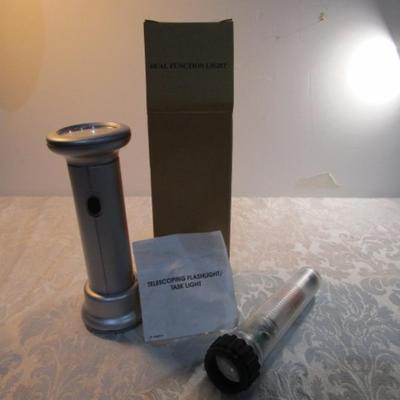 Sale Photo Thumbnail #737: Telescoping flashlight is a dual function flashlight & takes 2 C batteries not included, see pictures