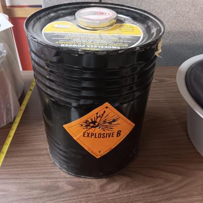 UNOPENED 12 LB DUPONT SMOKELESS POWDER, RELOADING GUIDES AND A SIEVE?