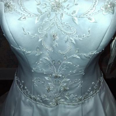 Sale Photo Thumbnail #55: Size 2
Brand New with tags. Comes with Crinolines (underskirts as well, gives it the princess look.)