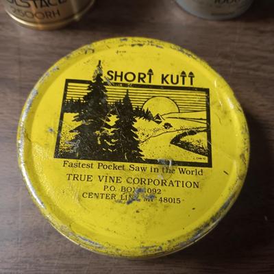 SHORT KUTT POCKET SAW, SPINNING REEL SPOOL, FISHING FLIES BOOK AND MORE