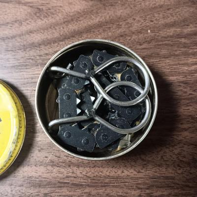 SHORT KUTT POCKET SAW, SPINNING REEL SPOOL, FISHING FLIES BOOK AND MORE