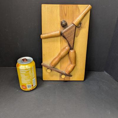 Carved Wooden Skateboarder Art