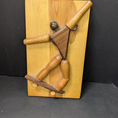 Carved Wooden Skateboarder Art