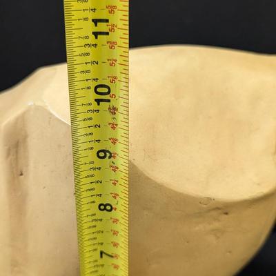 "Fragment Of A Queen's Face" is a Yellow Jasper From Egypt's New Kingdom