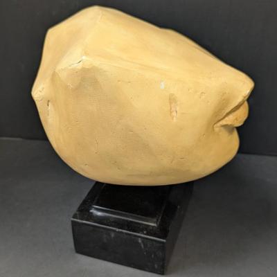 "Fragment Of A Queen's Face" is a Yellow Jasper From Egypt's New Kingdom