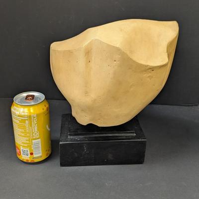 "Fragment Of A Queen's Face" is a Yellow Jasper From Egypt's New Kingdom