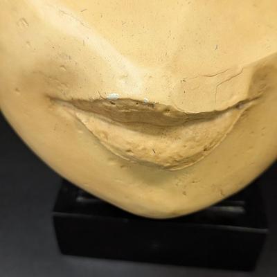 "Fragment Of A Queen's Face" is a Yellow Jasper From Egypt's New Kingdom