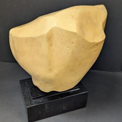 "Fragment Of A Queen's Face" is a Yellow Jasper From Egypt's New Kingdom