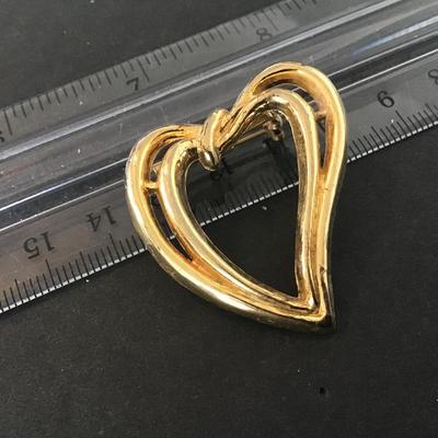 Signed a heart brooch