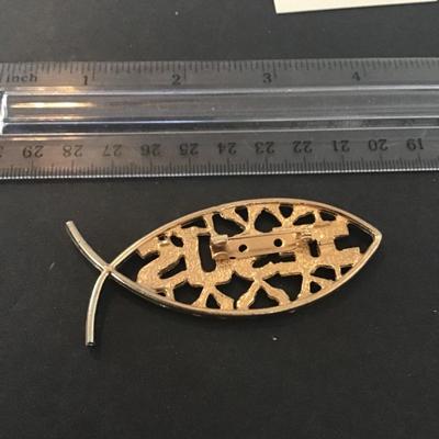 Sale Photo Thumbnail #154: Gold tone Jesus brooch please see attached photos