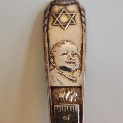 Sale Photo Thumbnail #279: This lot is for a 1948 Birth of Israel Commemorative Spoon.  This spoon is the size of a regular teaspoon and is silverplate. A nice commemorate item.