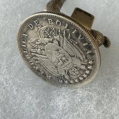 Sale Photo Thumbnail #229: Ideal for name holders or menu items on a buffet.
Totally charming.  
Set on top of Bolivian Coin, all 1909 dated