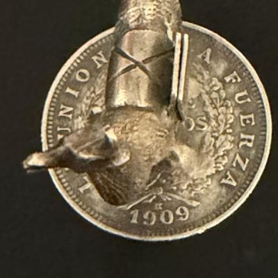 Sale Photo Thumbnail #230: Ideal for name holders or menu items on a buffet.
Totally charming.  
Set on top of Bolivian Coin, all 1909 dated