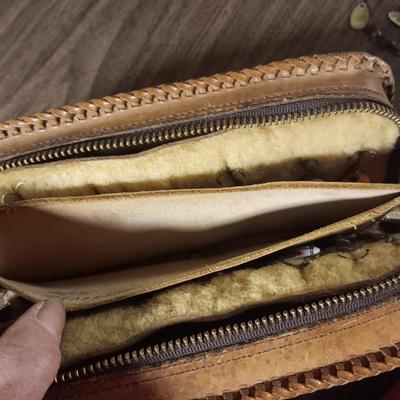 LEATHER LURE BOOK FULL OF FISHING LURES