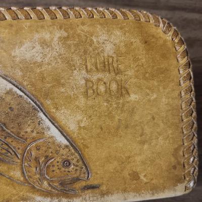 LEATHER LURE BOOK FULL OF FISHING LURES