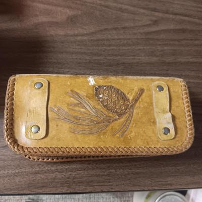 LEATHER LURE BOOK FULL OF FISHING LURES